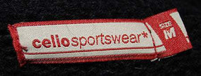Close-up of a red and white Celio Sportswear size M label on a men's soft black turtleneck lambswool angora sweater