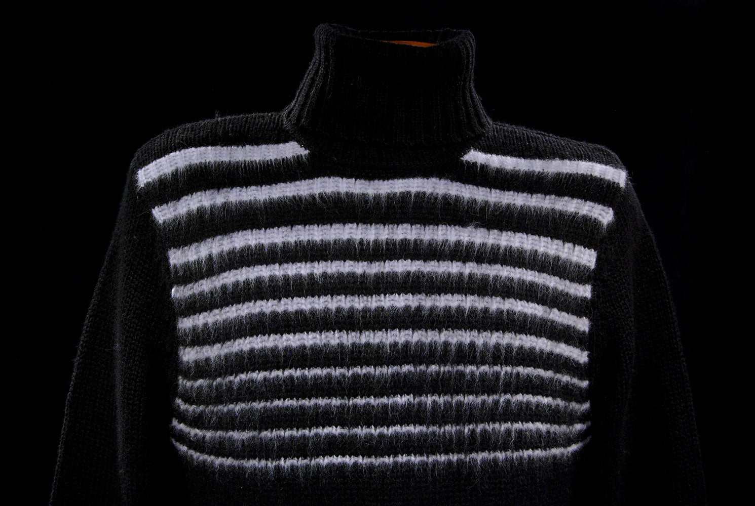 Men's soft black turtleneck sweater with narrow white horizontal angora stripes made of lambswool and angora blend