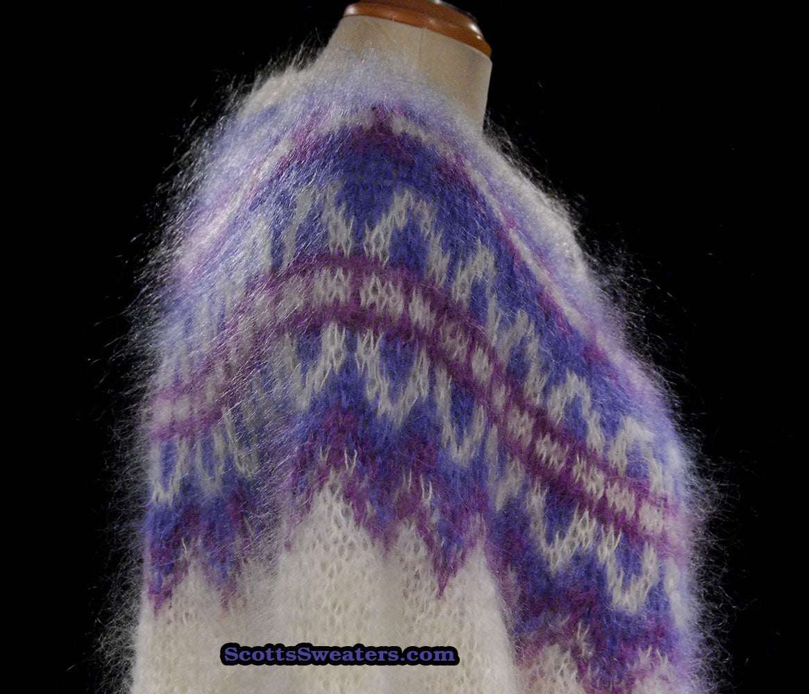 Colorful woman's mohair cardigan sweater in purple and white Icelandic design on mannequin