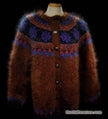 Colorful woman's mohair cardigan sweater with Icelandic design and metal buttons on mannequin