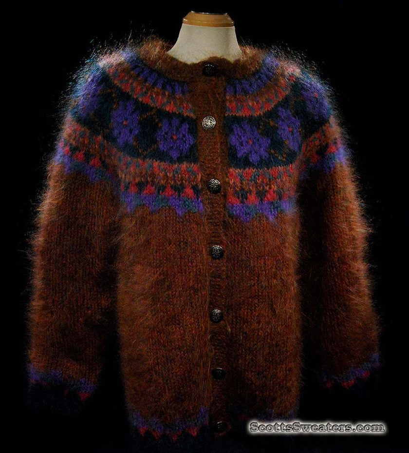 Colorful woman's mohair cardigan sweater with Icelandic design and metal buttons on mannequin