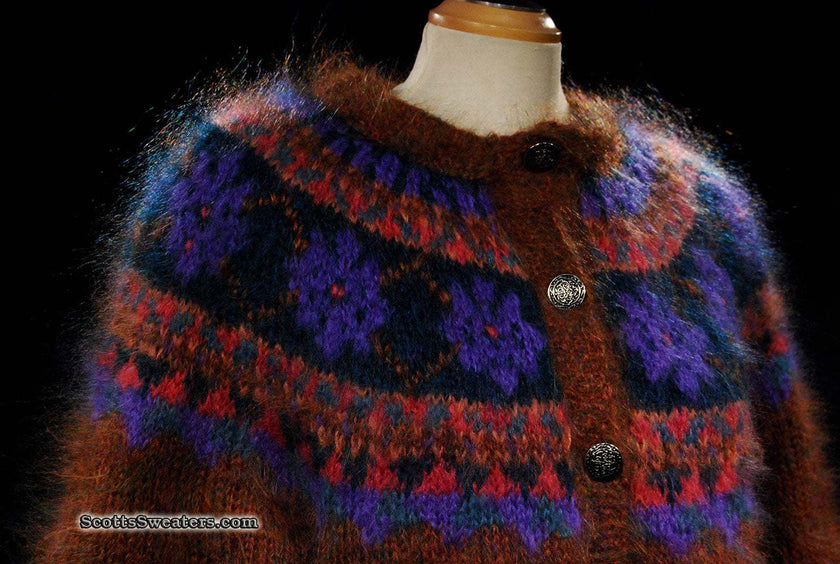 Colorful woman's mohair cardigan sweater with metal buttons and traditional Icelandic design