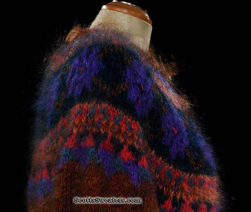 Colorful woman's mohair cardigan sweater by Icelandic design with vibrant pattern and metal buttons