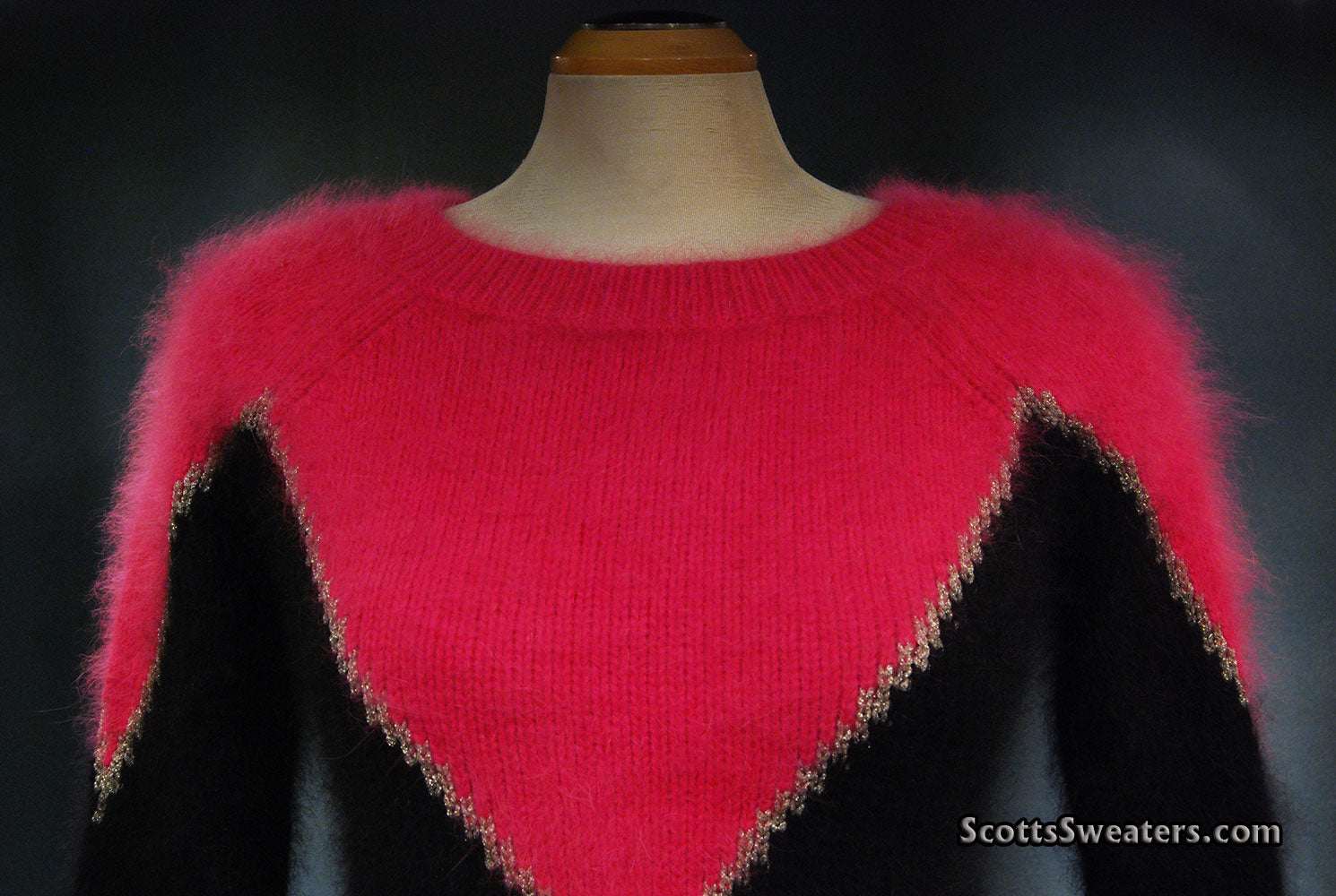 Two-tone angora sweater by Juicy Couture with soft pullover design