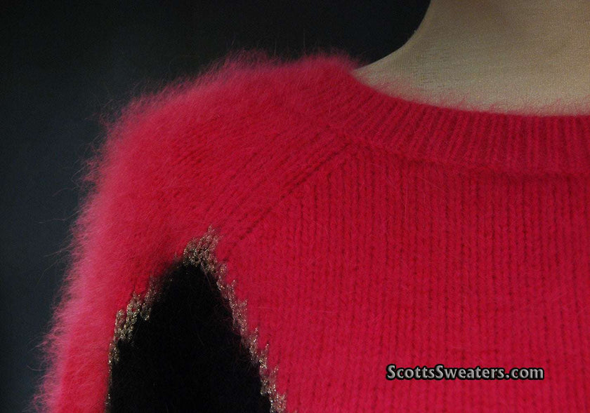 Two-tone angora sweater by Juicy Couture showcasing soft, bold design