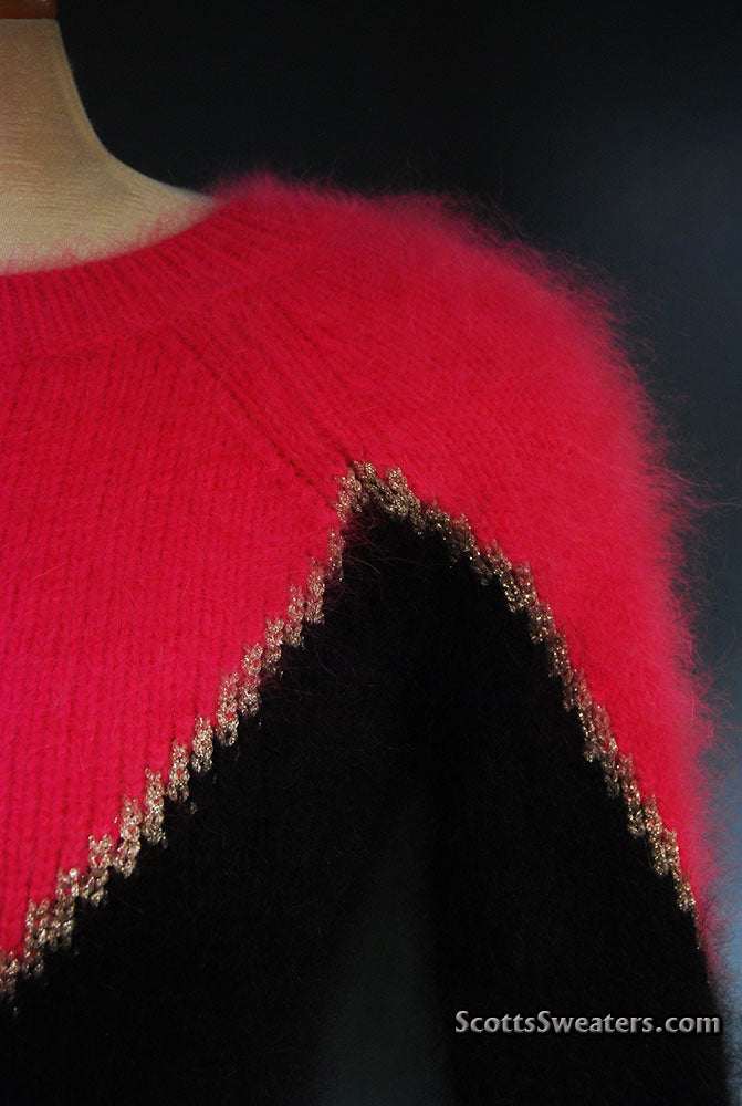 Two-tone angora sweater by Juicy Couture with soft texture and bold design