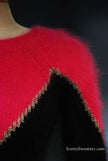 Two-tone angora sweater by Juicy Couture with soft texture and bold design