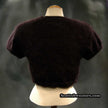 Dark brown woman's angora shrug cardigan sweater by Express displayed on a mannequin.