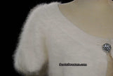 White woman's angora shrug cardigan sweater with jeweled rhinestone button by Express
