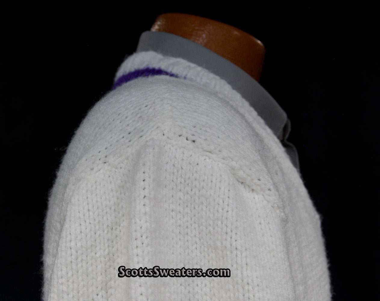 White hand-knit men's V-neck tennis sweater with purple stripes on neck, waist, and cuffs, size 2XL