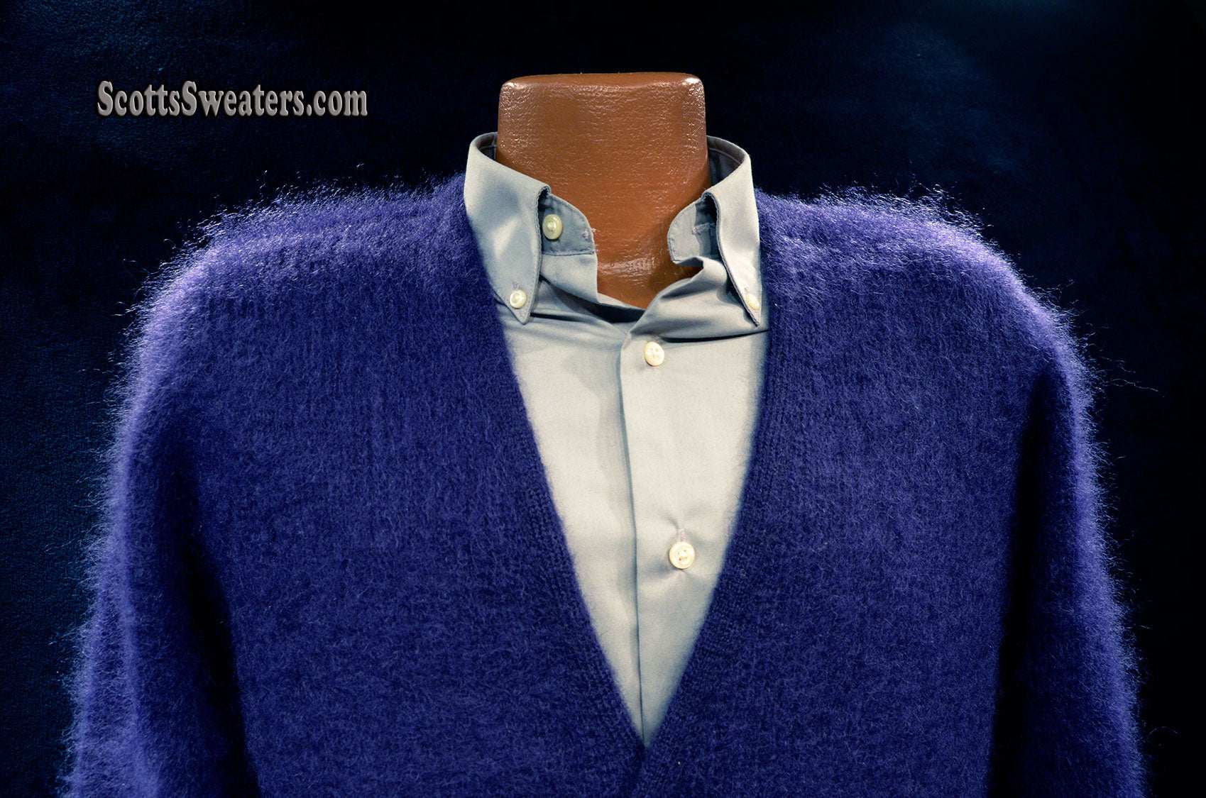 Men's navy blue mohair cardigan sweater by Sibling London with front pockets and rich texture