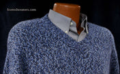 Men's blue and white tweed knit 100% cashmere V-neck sweater on mannequin with gray dress shirt.