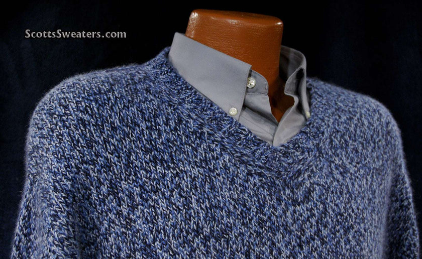 Men's blue and white tweed knit 100% cashmere V-neck sweater on mannequin with gray dress shirt.