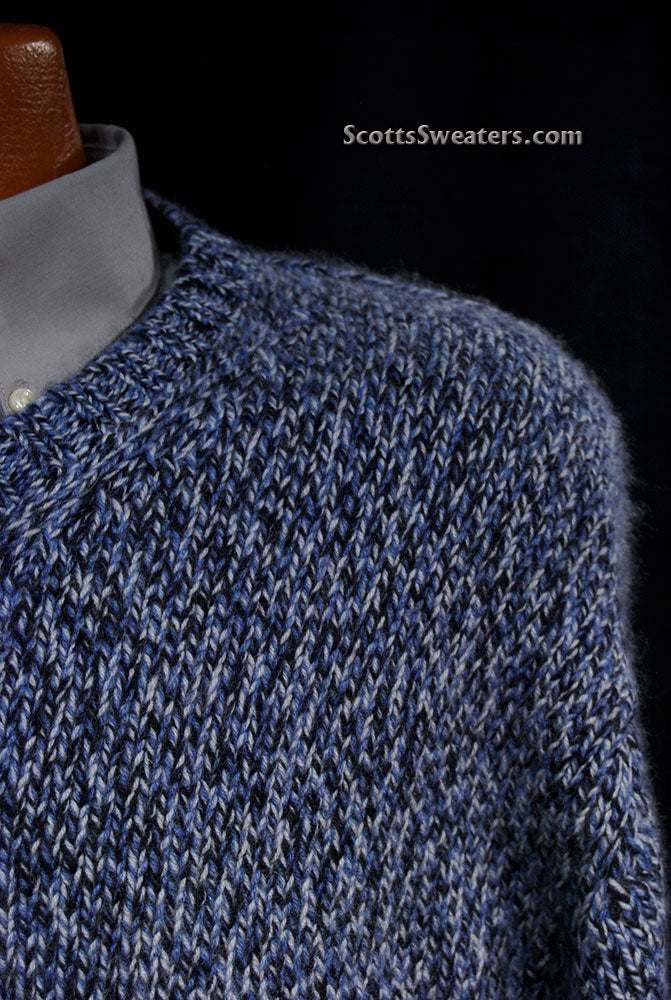 Close-up of men's blue and black tweed knit cashmere V-neck sweater by Daniel Cremieux on mannequin