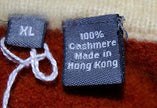 Men's cashmere sweater size XL tag made in Hong Kong close-up