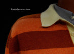 Men's orange and brown two-tone striped cashmere polo-neck sweater with yellow collar