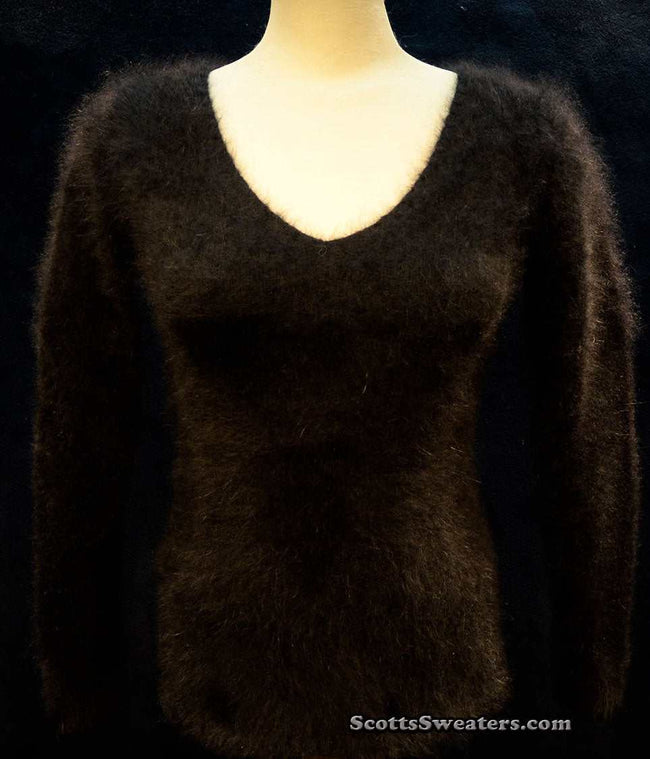 Woman wearing tan Woman's Angora Scoop Neck Sweater with cling-fit design by Banana Republic
