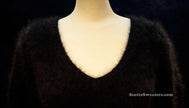 Woman wearing tan Woman's Angora Scoop Neck Sweater by Banana Republic in cling-fit design