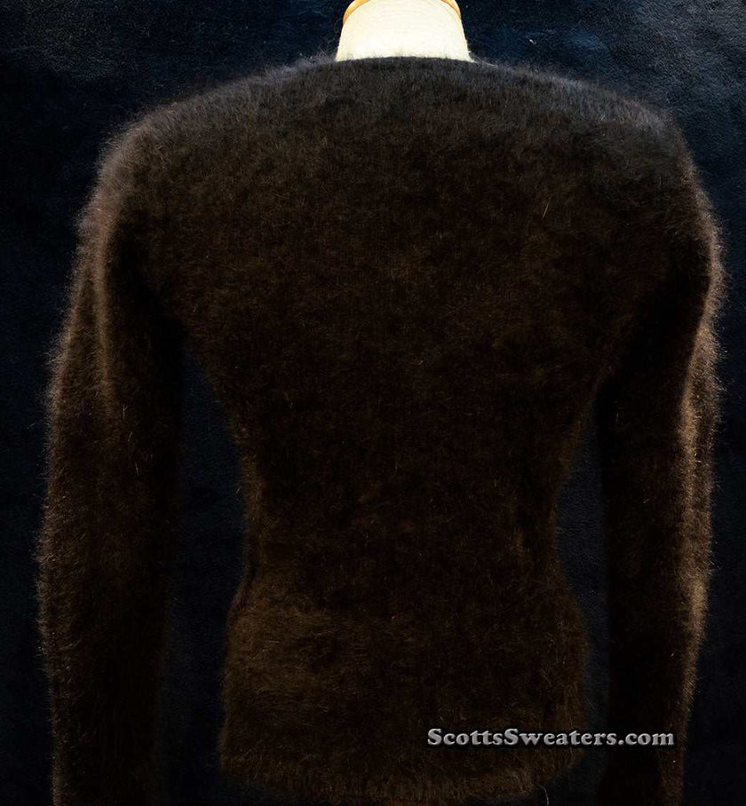 Woman wearing muted tan Angora scoop neck pullover sweater by Banana Republic in cling-fit design