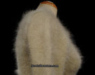 Woman wearing tan angora scoop neck cling-fit sweater by Banana Republic