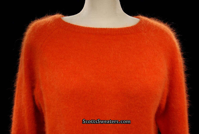 Woman's orange angora jewel-neck fuzzy sweater by H&M size medium