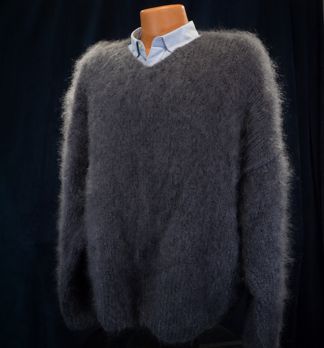 Men's slate-grey hand-knit mohair V-neck sweater on mannequin with blue shirt.