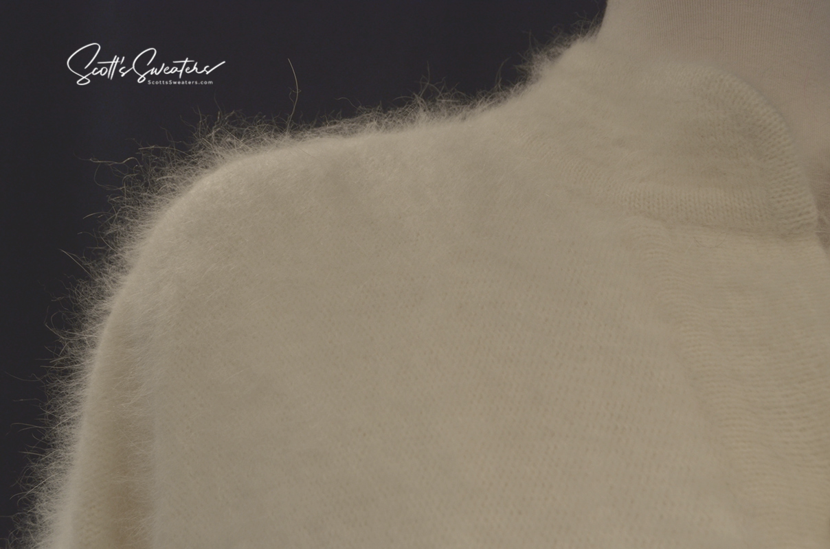 Woman's white angora cardigan sweater with soft nylon lining by Belldini, size large