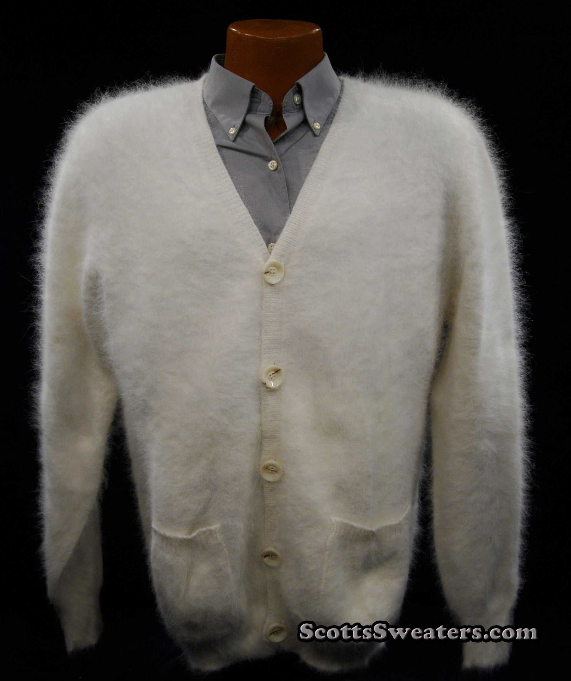 Men's ultra-soft angora cardigan sweater in white with buttons and pockets on mannequin