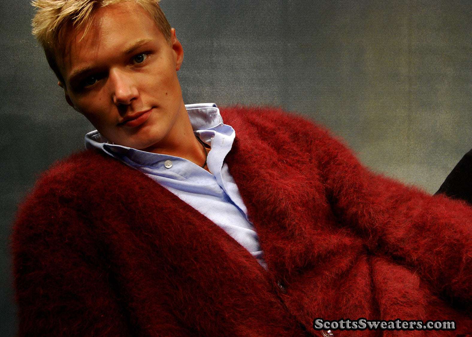 Men's ultra-soft angora cardigan sweater in deep red worn by male model