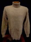 Men's ultra-soft angora turtleneck sweater in beige color displayed on a mannequin
