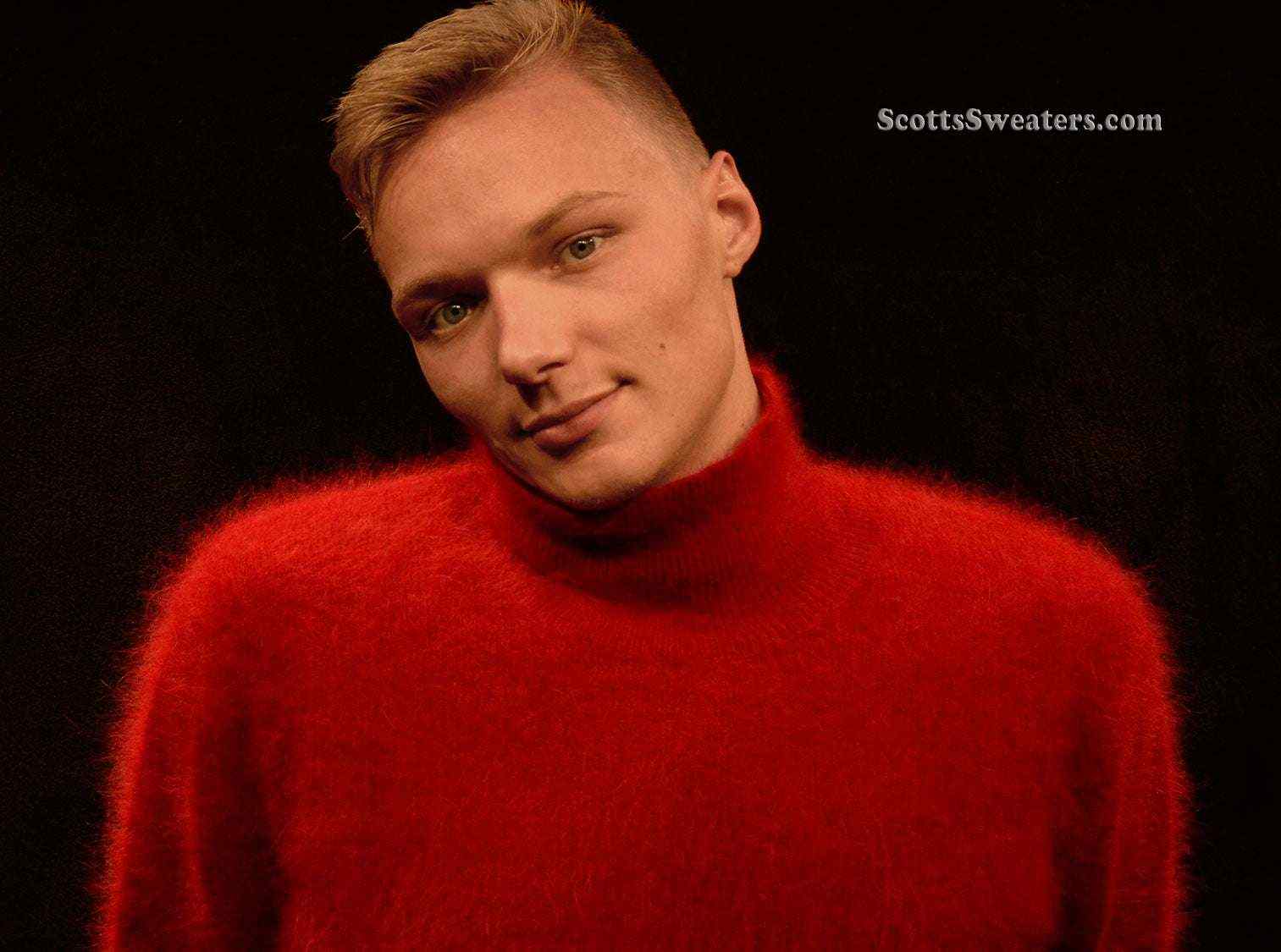 Men's ultra-soft angora turtleneck sweater in red worn by model