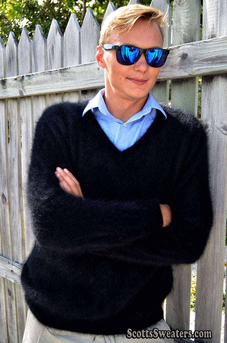 Men's ultra-soft black angora V-neck sweater worn outdoors