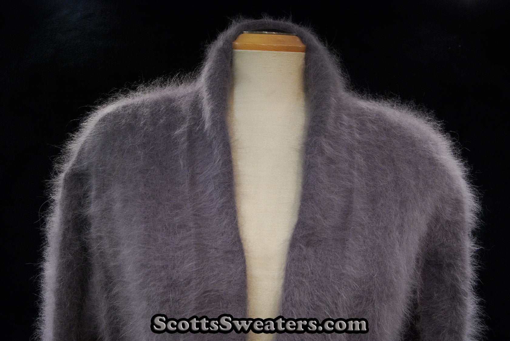 Woman's open-front angora cardigan sweater with turn-down collar and lantern sleeves by Cocol