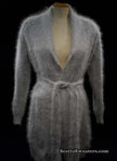 Woman wearing ultra-soft open-front angora cardigan sweater with turn-down collar and lantern sleeves by Cocol