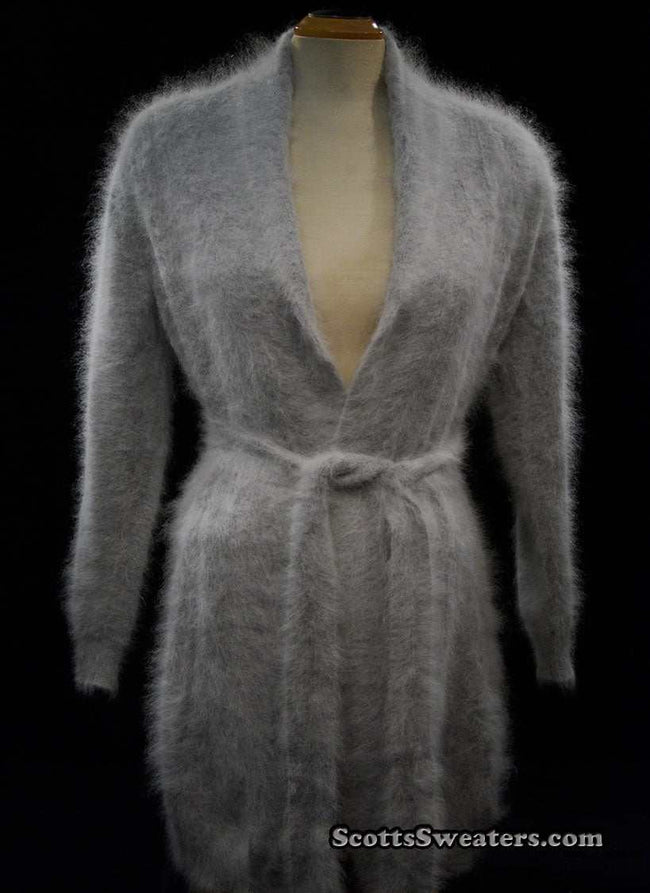 Woman wearing ultra-soft open-front angora cardigan sweater with turn-down collar and lantern sleeves by Cocol