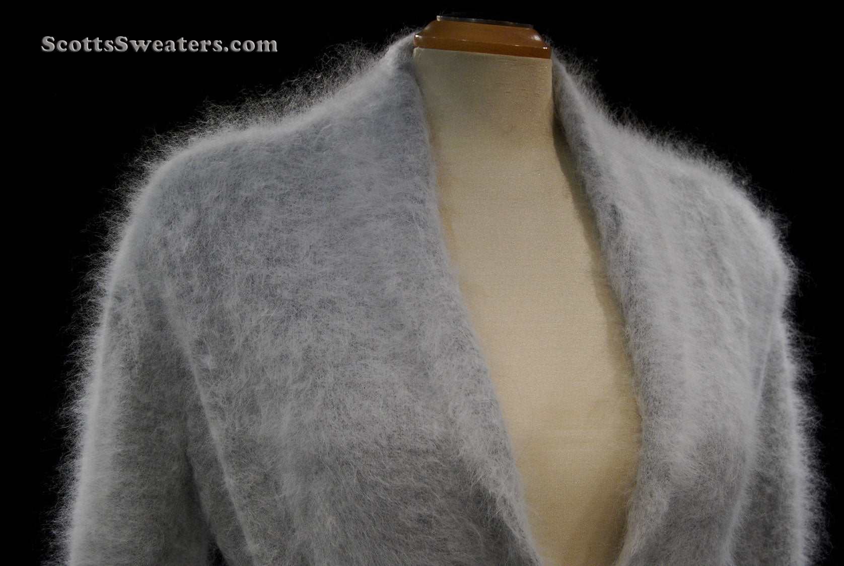 Woman's open-front angora cardigan sweater with turn-down collar and lantern sleeves by Cocol