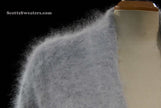 Woman wearing ultra-soft open-front angora cardigan sweater with turn-down collar and lantern sleeves by Cocol