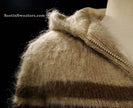 Close-up of a rare tan hooded Woman's Icelandic Wool Coat with horizontal three-tone stripes and nylon lining by Hilda Ltd.