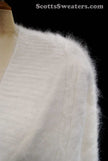 Woman's white angora shawl-neck cardigan sweater with single-button closure by Lee Sands in plus and missy sizes