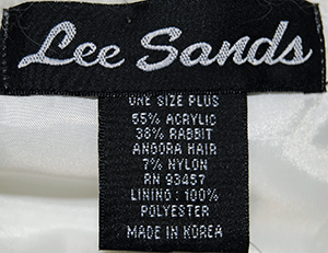 Woman's white plus and missy sized angora shawl-neck cardigan sweater with single-button closure by Lee Sands