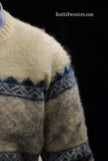 Ivory Icelandic wool crewneck sweater with grey-blue snowflake design by Samband of Iceland