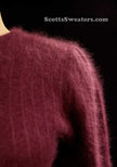 Woman's 2-piece matching deep-purple Angora sweater set with short-sleeve top and open-front cardigan with leather appliqué