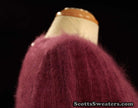 Woman's 2-piece matching deep-purple Angora sweater set with leather design appliqué