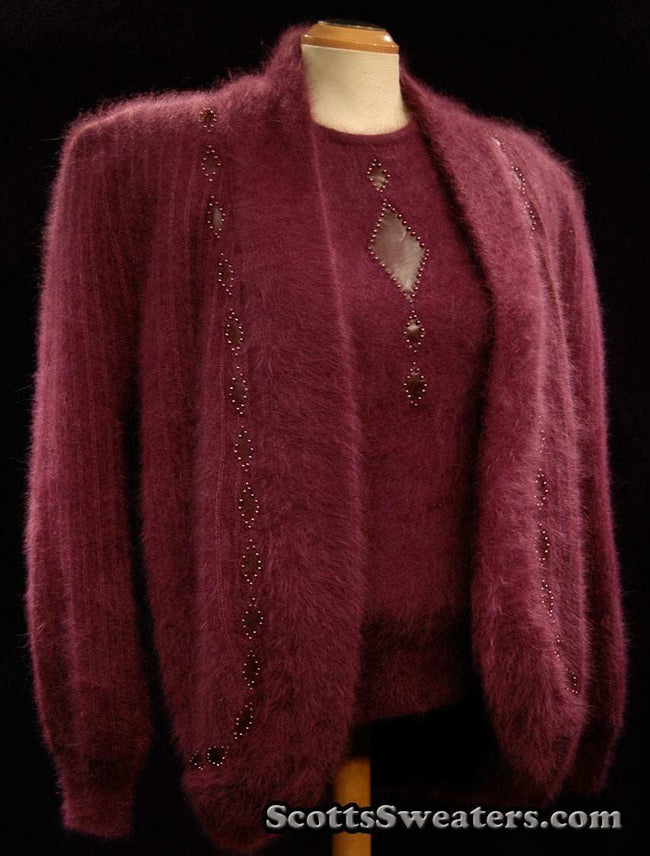 Deep-purple woman's 2-piece matching Angora sweater set with short-sleeve sweater and open-front cardigan with leather appliqué
