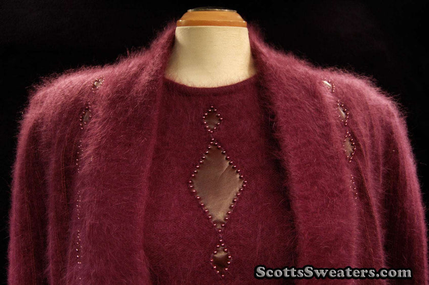 Woman's 2-piece matching deep-purple angora sweater set with short-sleeve sweater and open-front cardigan with leather appliqué