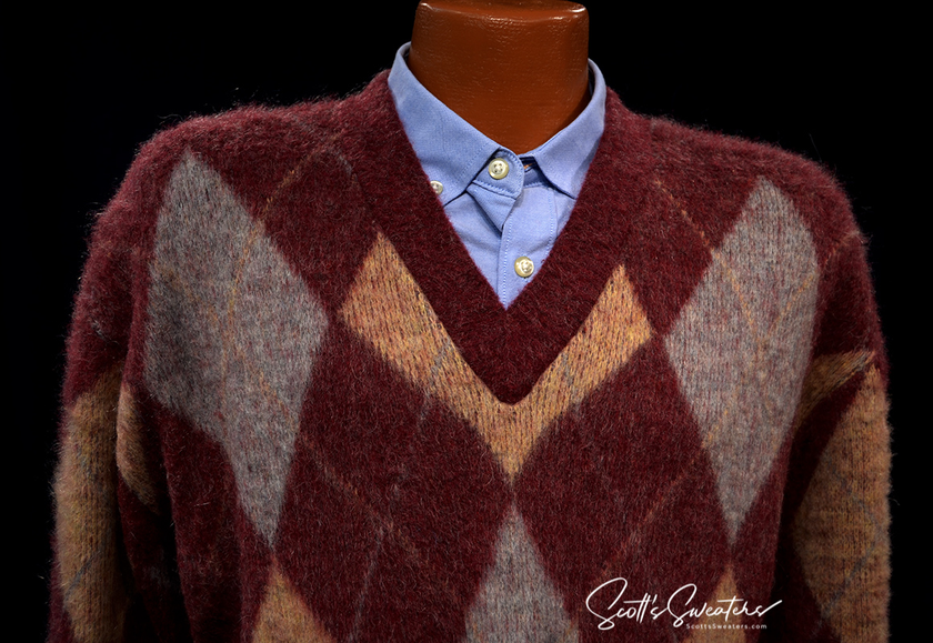 Retro shaggy argyle mohair V-neck sweater in three colors on mannequin with blue shirt