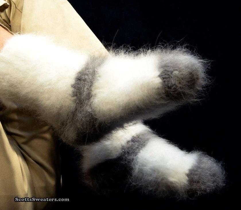 Hand-knit thick and warm Siberian Angora socks with soft fuzzy texture in white and gray colors.