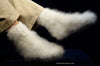 Hand-knit thick and warm white Siberian Angora socks with a soft fuzzy texture worn with beige pants