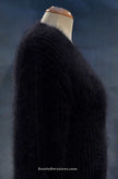 Black angora V-neck sweater for women by Michael Kors displayed on mannequin.