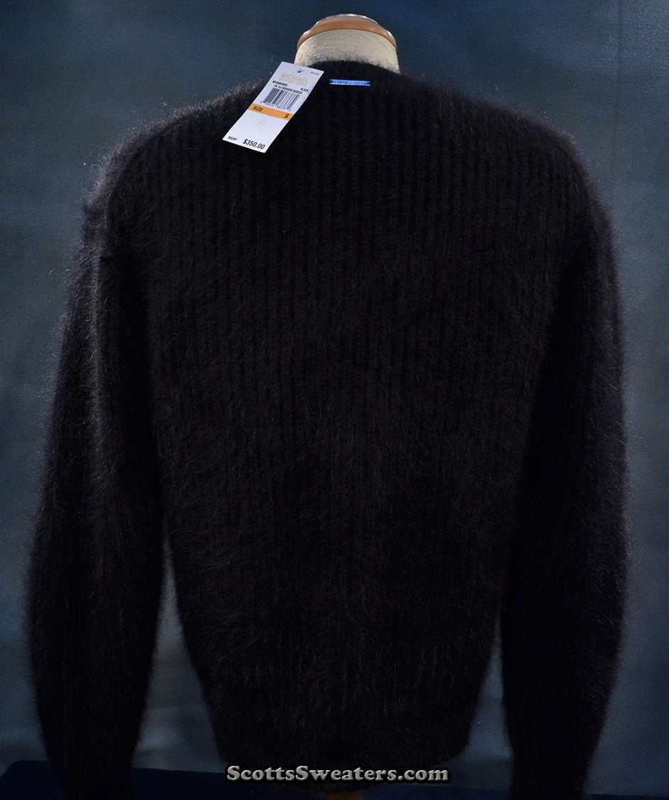 Woman's black V-neck angora sweater by Michael Kors displayed on mannequin with tags visible
